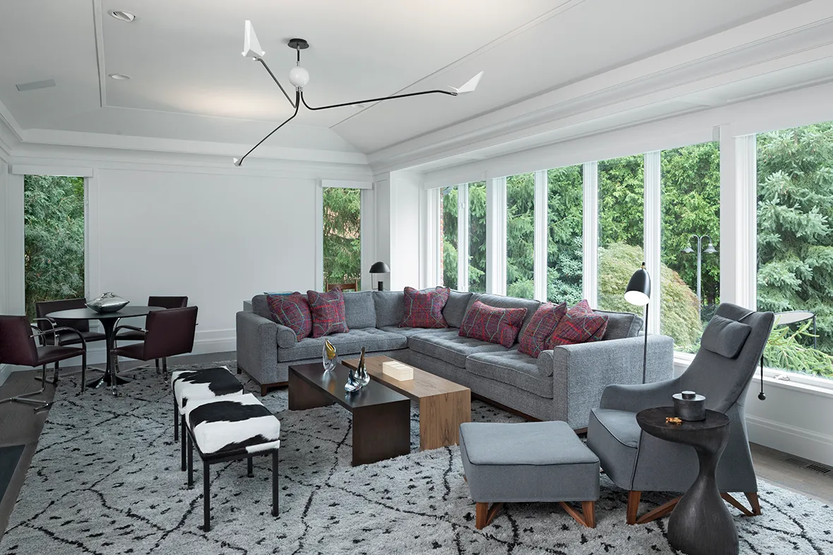 The Lake House Diamond Building Modern Living Room White Walls Grey and Maroon Color Pallette
