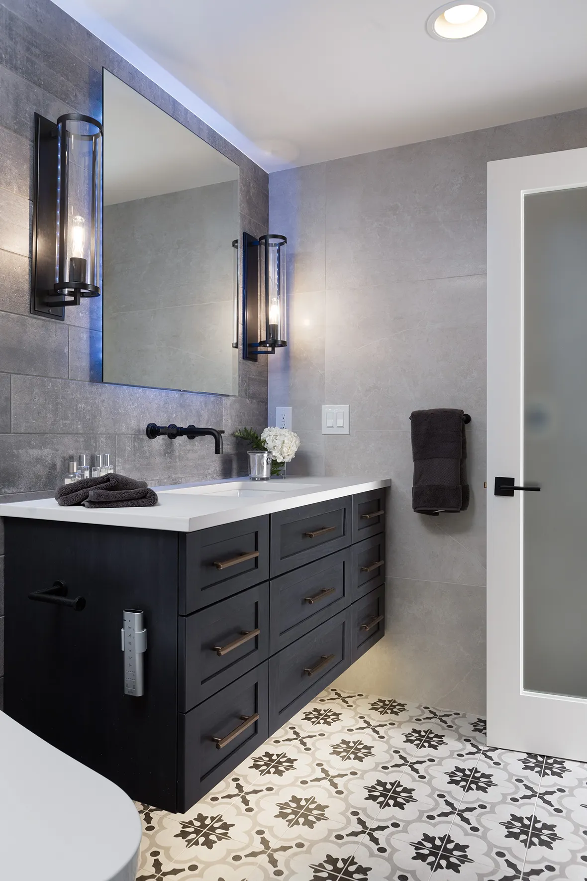 Talbot Diamond Building Full Basement Bathroom with Glowing Mirror Featured